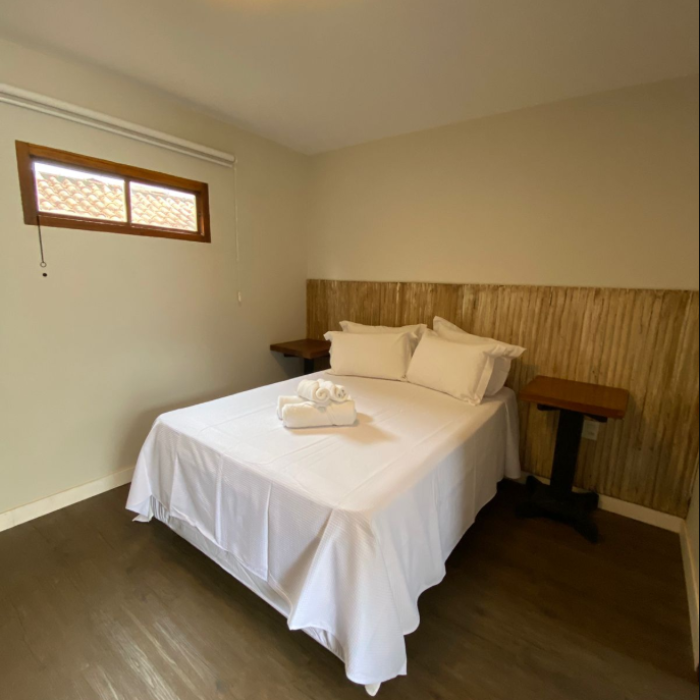 suíte com varanda e cama king